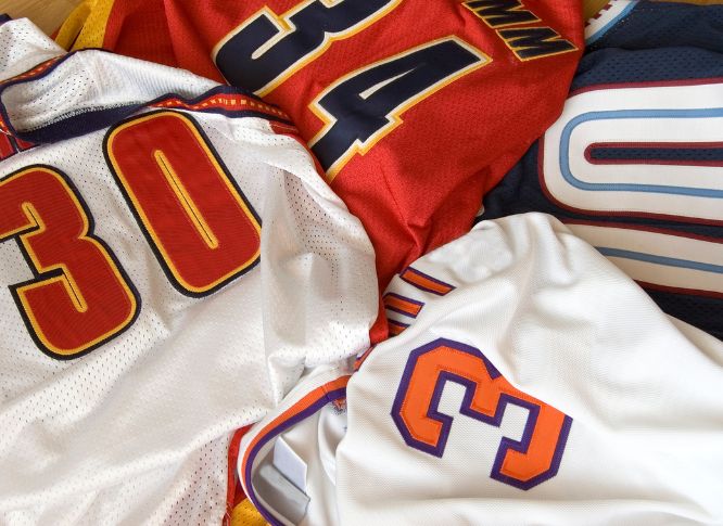 A pile of generic football jerseys.
